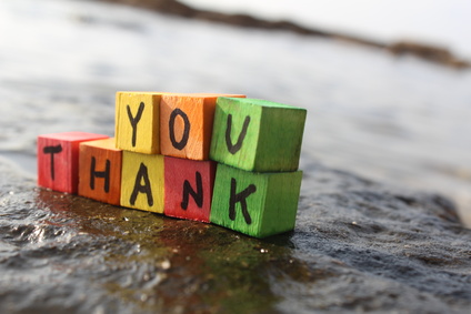 Thank you written with wood cubes